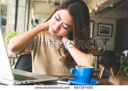 Woman have neckache during working in office